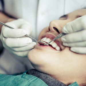 Dentists treat patients' teeth.